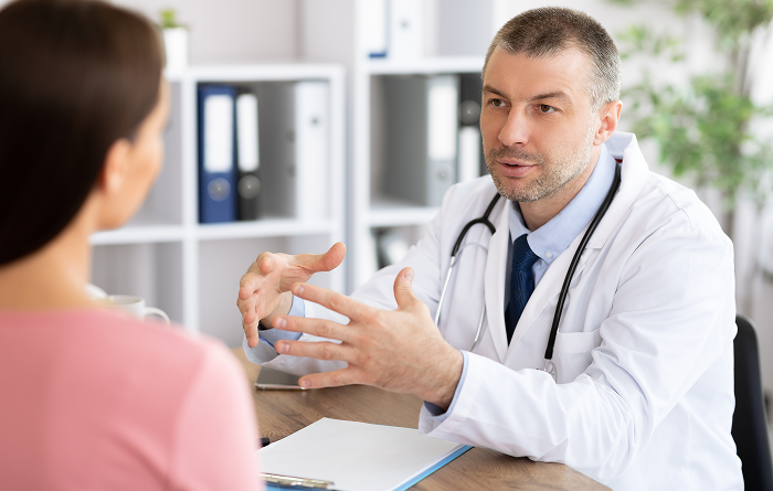 Man talking to patient